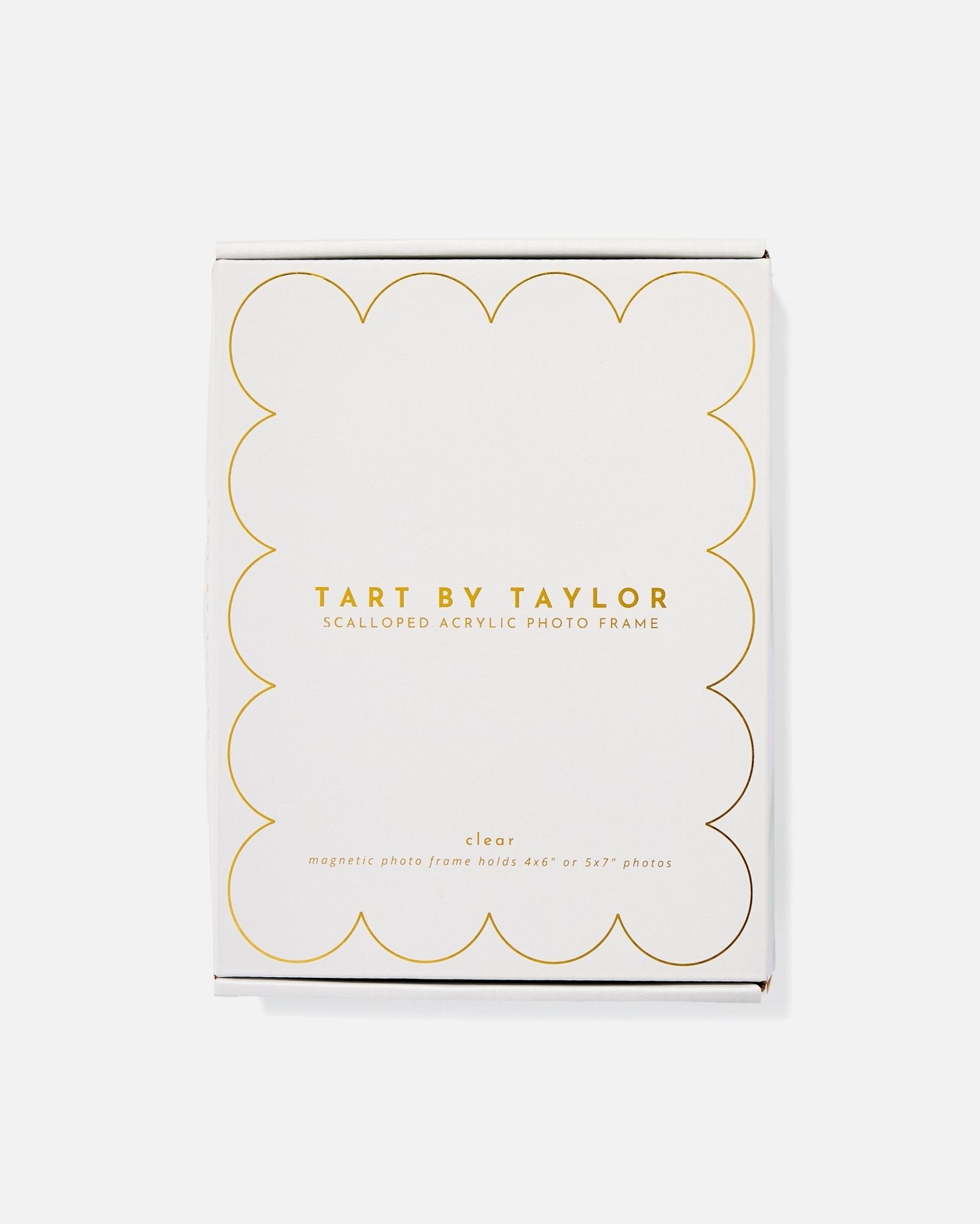 Box of Tart by Taylor scalloped acrylic photo frame on a white background