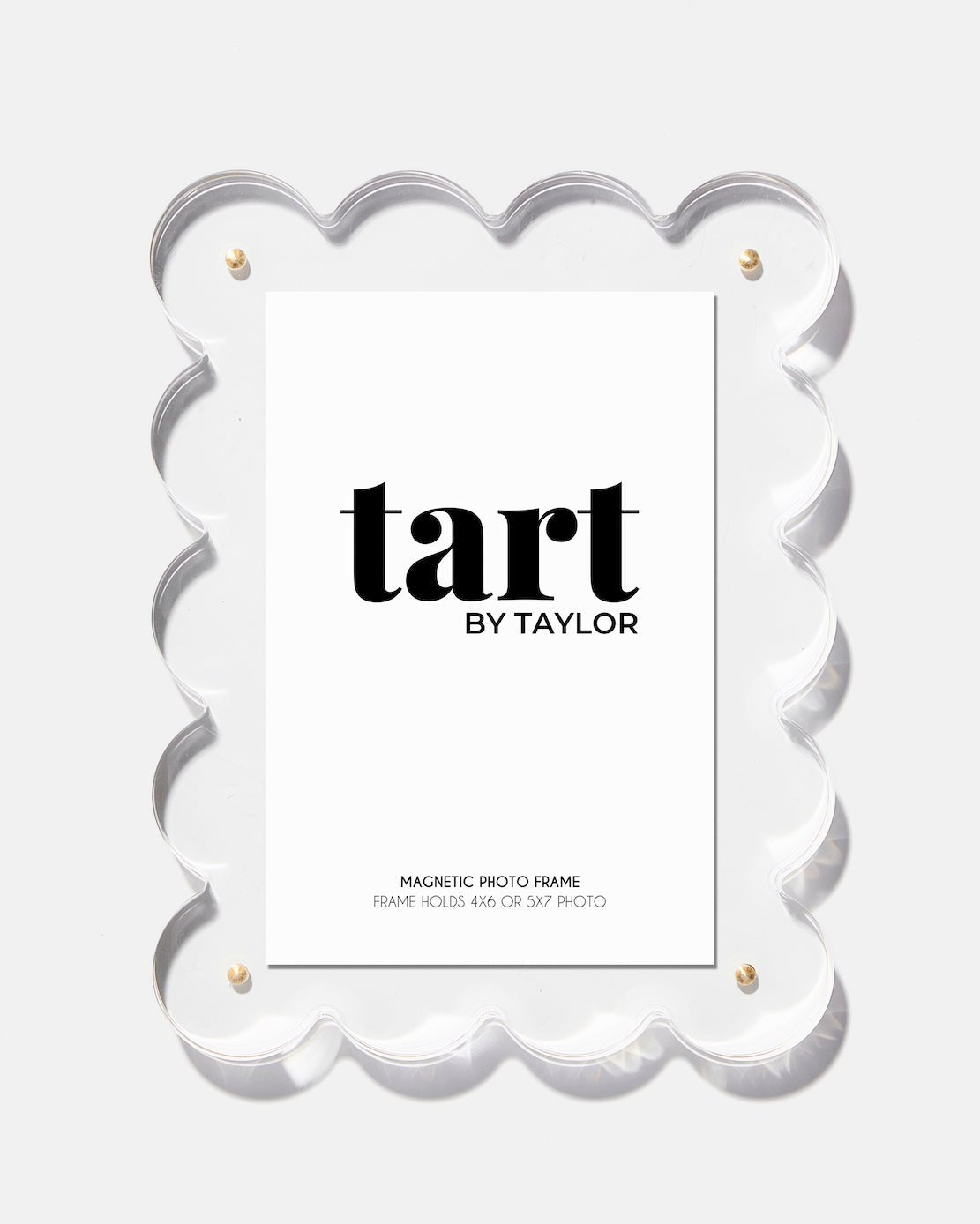 Magnetic photo frame with 'tart by Taylor' branding on a white background