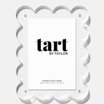 Magnetic photo frame with 'tart by Taylor' branding on a white background