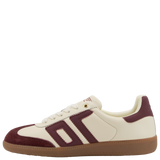White and maroon sneaker with a brown sole on a white background