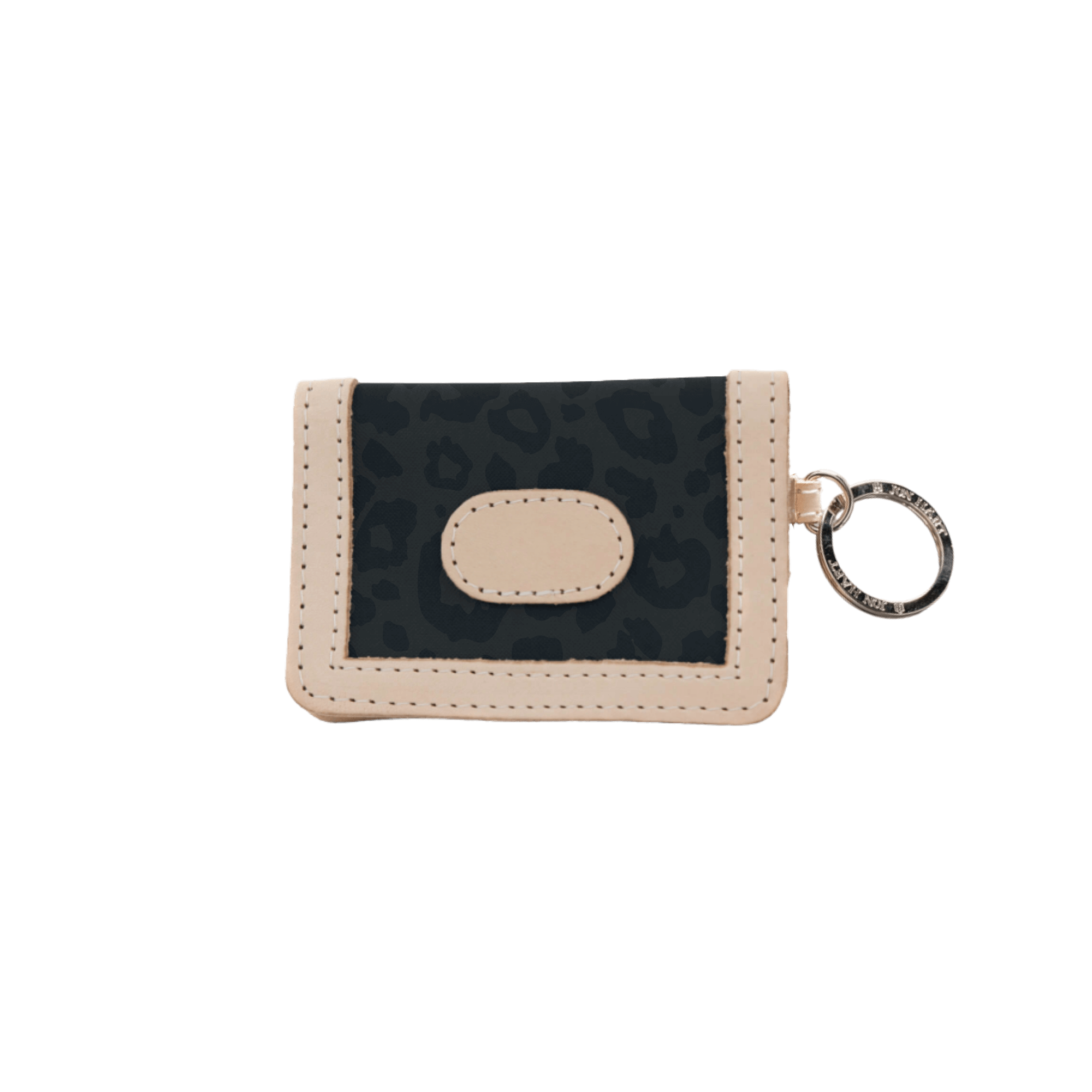 Small beige wallet with a keychain on a black background