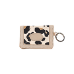 Small wallet with leopard print design on a beige background