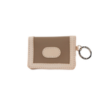 Small beige wallet with a key ring on a white background