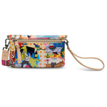 Colorful patterned wristlet with a strap on a white background