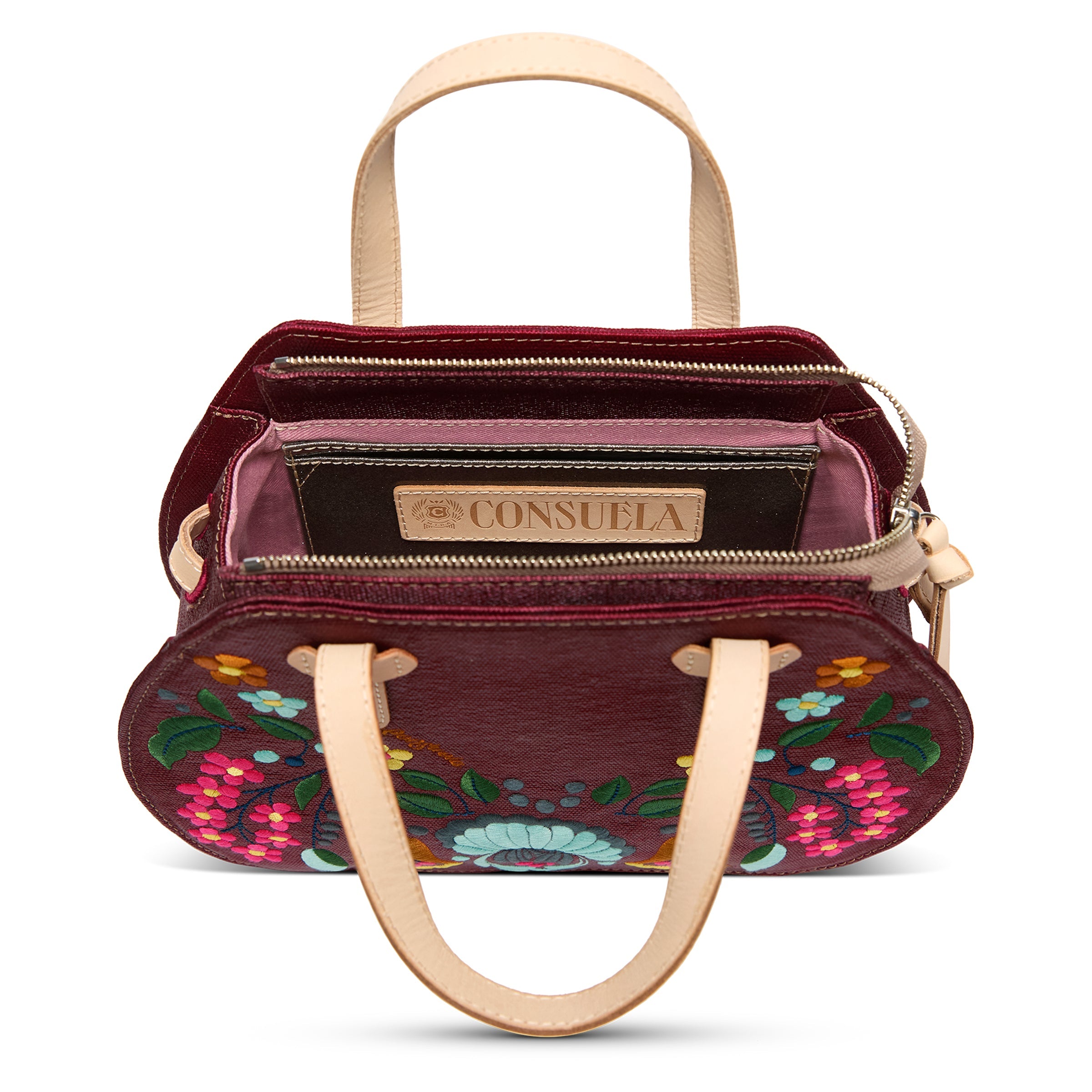 Handbag with floral embroidery and visible brand name on a white background