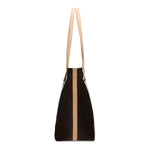 Black tote bag with a beige strap on a white background