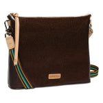 Brown crossbody bag with striped strap on a white background
