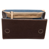 Brown leather pouch with denim interior and text on a white background