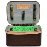 Open Consuela travel case with green interior lining on a white background