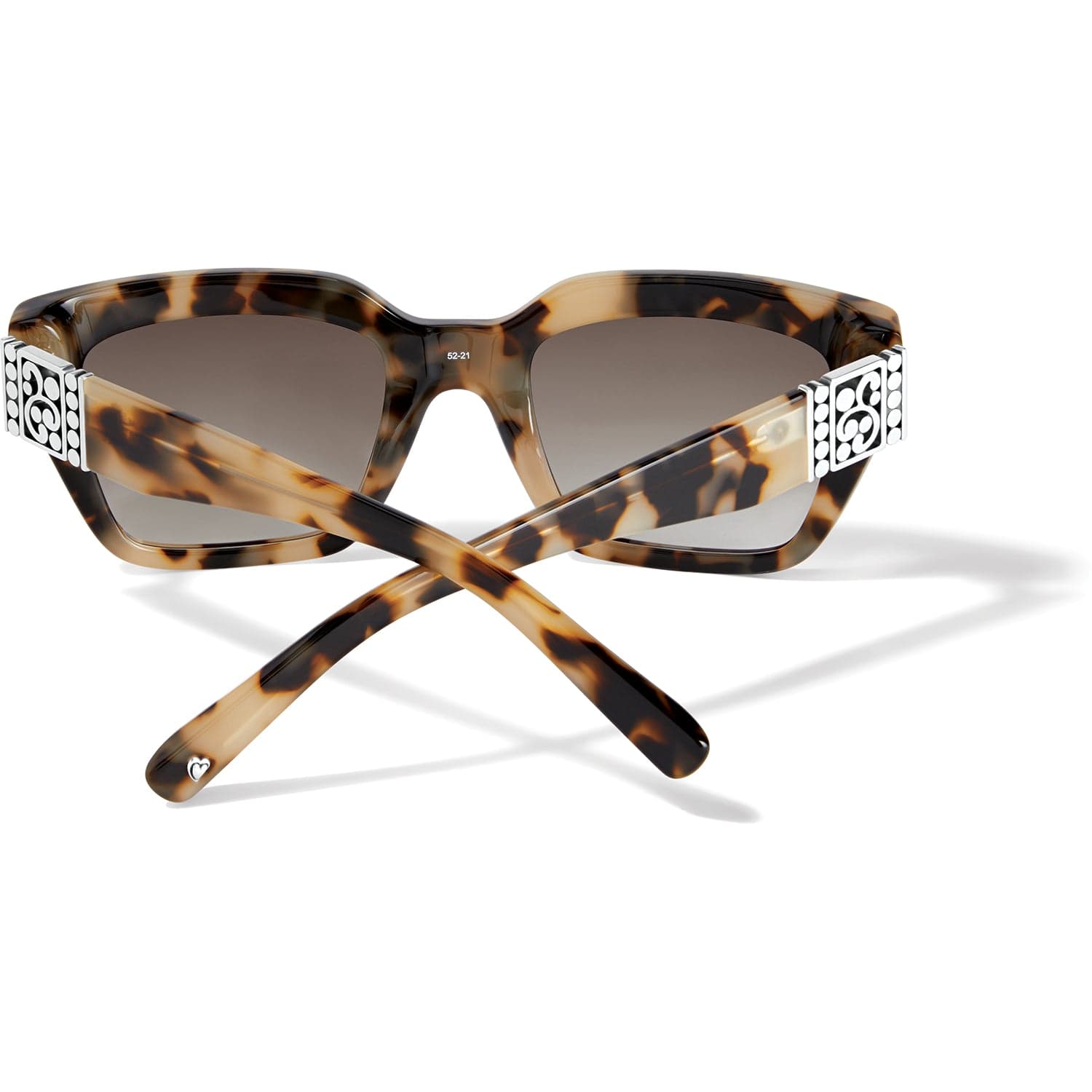 Tortoiseshell sunglasses with decorative arms on a white background