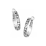 A pair of silver-colored hoop earrings with small hoop designs linked together.