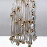 SILVER WIRED STRETCH BRACELETS W/ GOLD ACCENTS