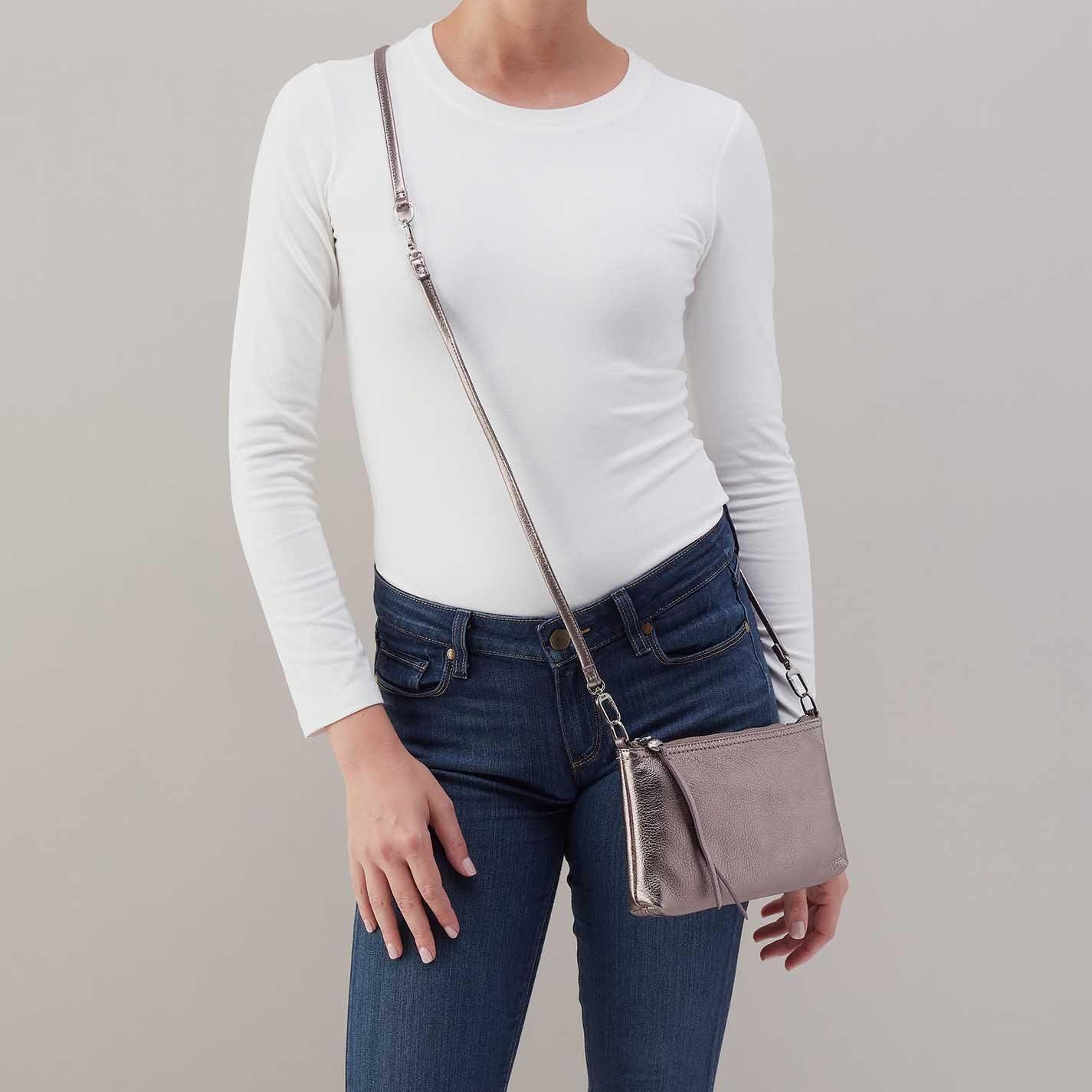 Hobo Darcy Convertible Crossbody in pewter leather with adjustable strap and sleek, versatile design.