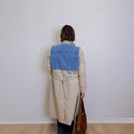 woman wearing a long trench coat 