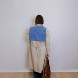 woman wearing a long trench coat 