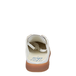 White sneaker with brown sole on a white background