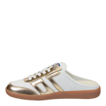 White and gold sneaker with a visible brand logo on a white background