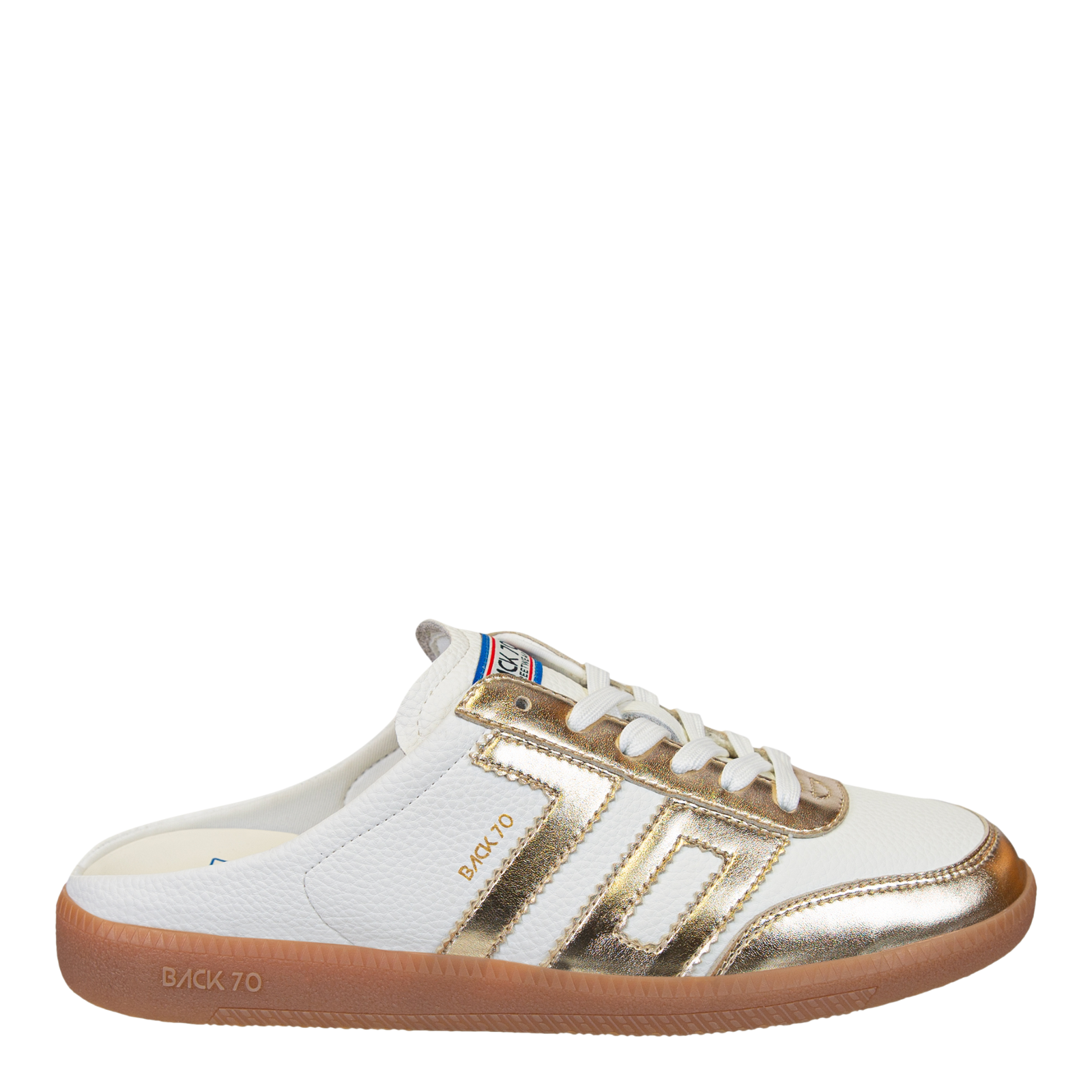 White and gold sneaker with brown sole on a white background