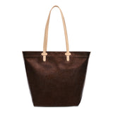 Brown tote bag with beige handles on a white background