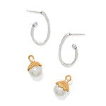 Pair of hoop earrings with pearl pendants on a white background