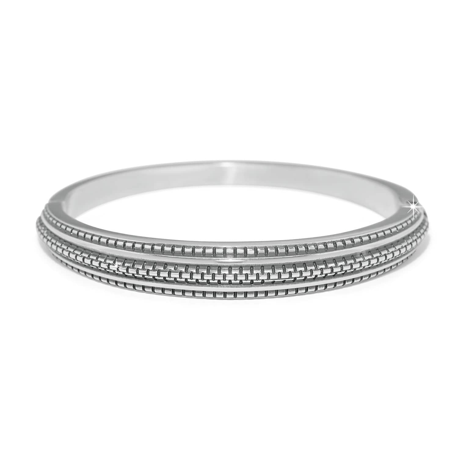 Silver bangle on a white background