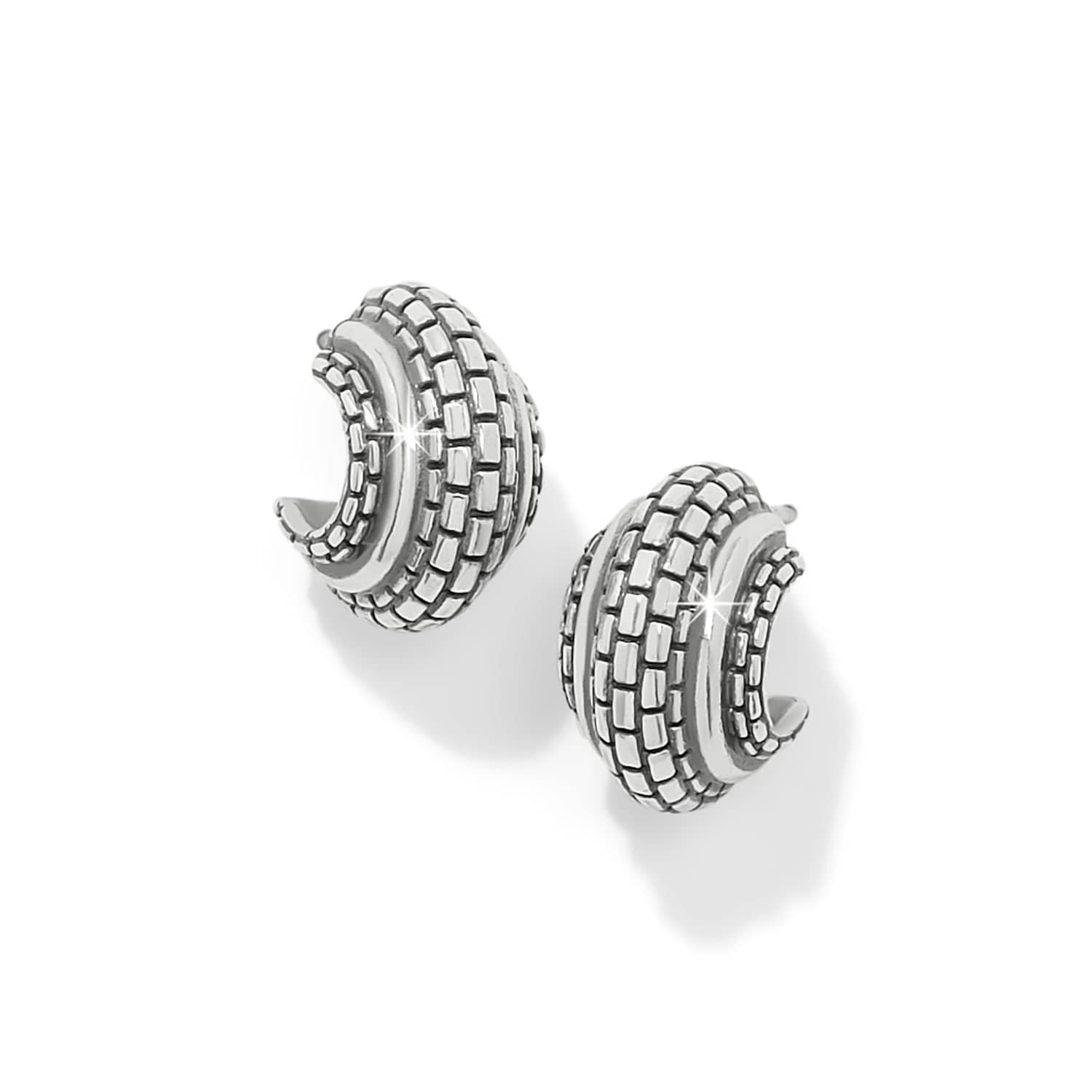 Pair of silver hoop earrings on a white background