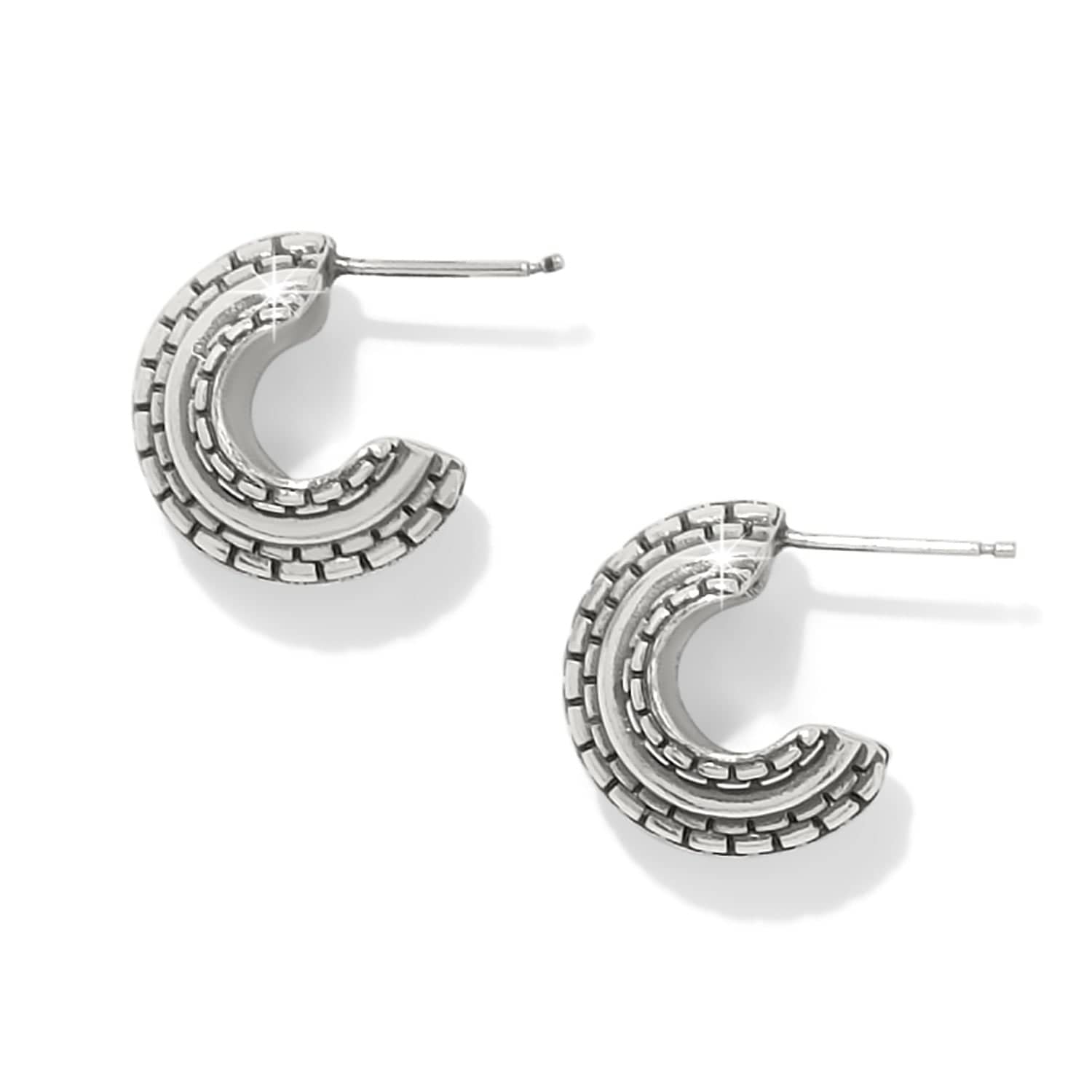 Silver hoop earrings on a white background