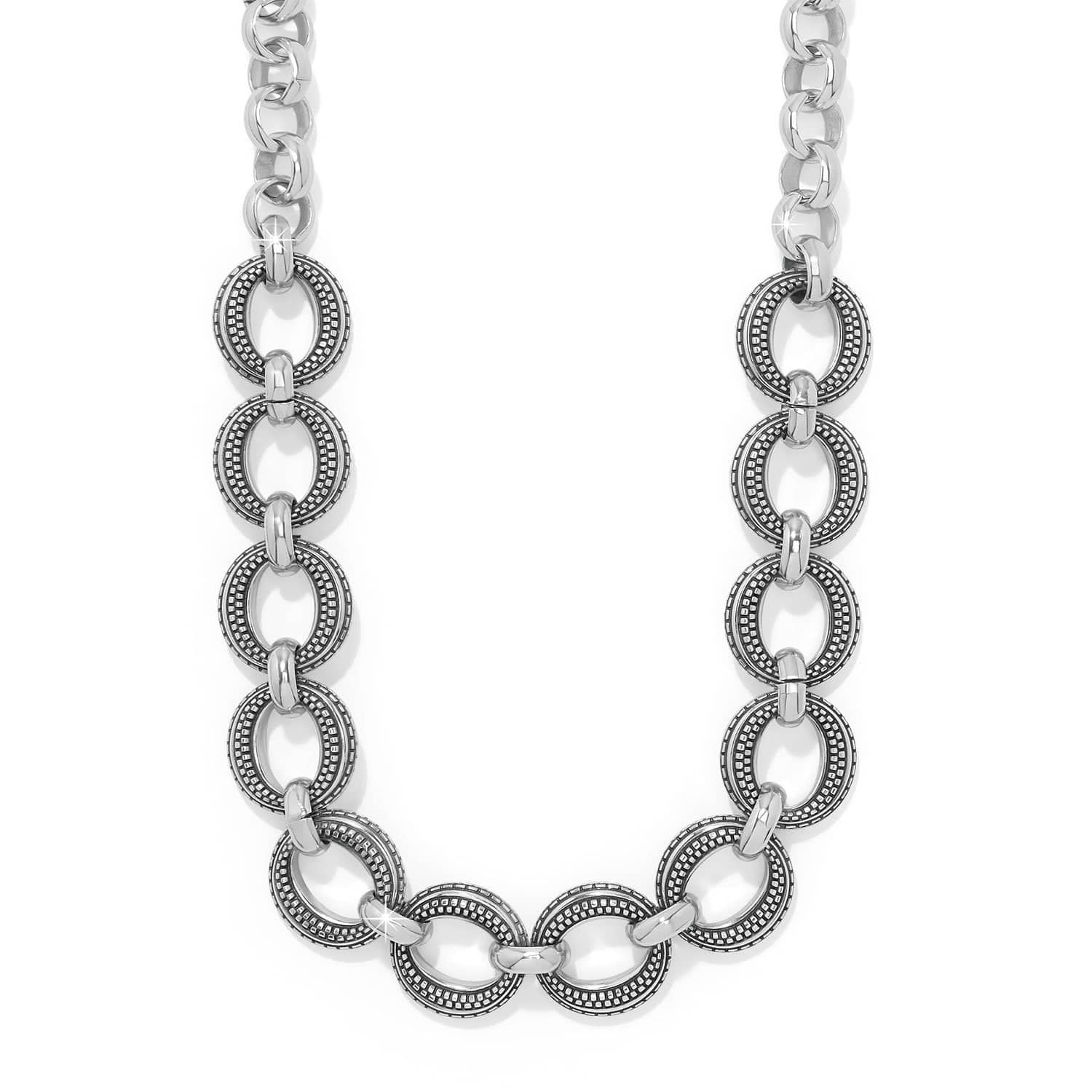 Silver chain necklace on a white background