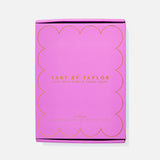 Pink packaging box with gold text on a white background