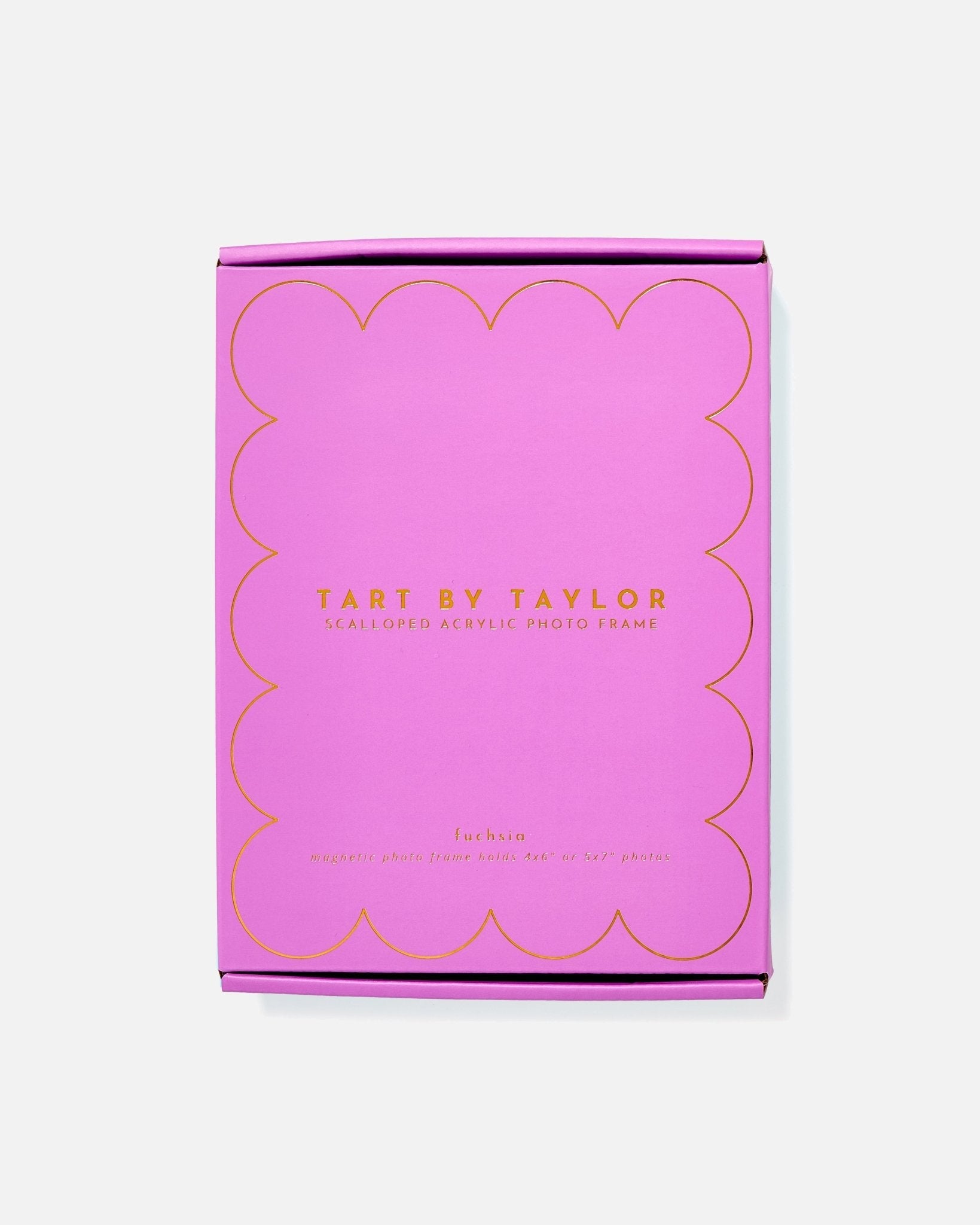 Pink packaging box with gold text on a white background