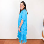 Gail tiered ruffle dress in turquoise featuring a relaxed fit and layered ruffle hem.