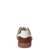 Brown and white sneaker on a white background