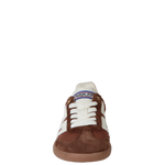 Brown and white sneaker with visible brand name on a white background