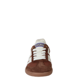 Brown and white sneaker with visible brand name on a white background