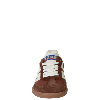 Brown and white sneaker with visible brand name on a white background