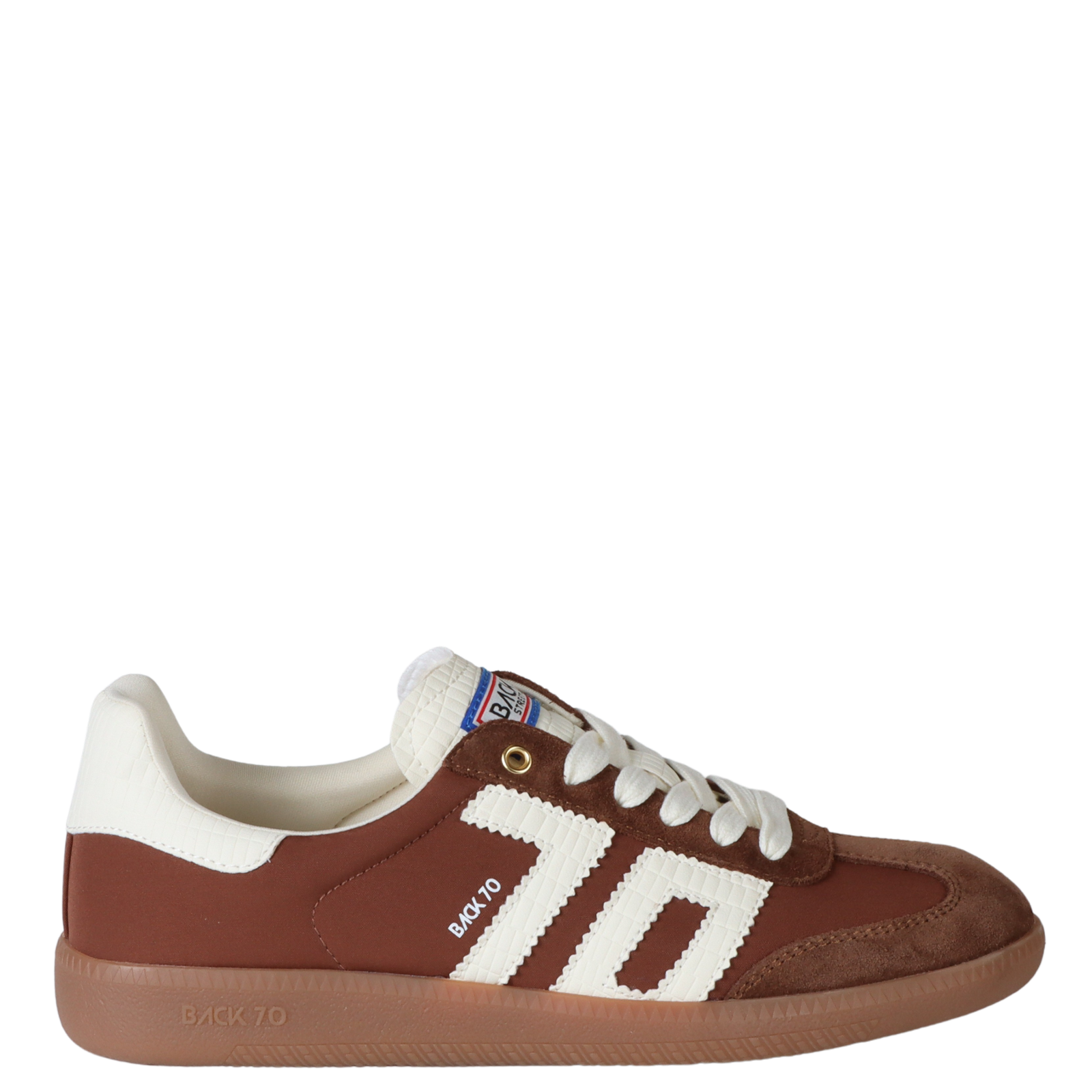 Brown and white sneaker with visible branding on a white background