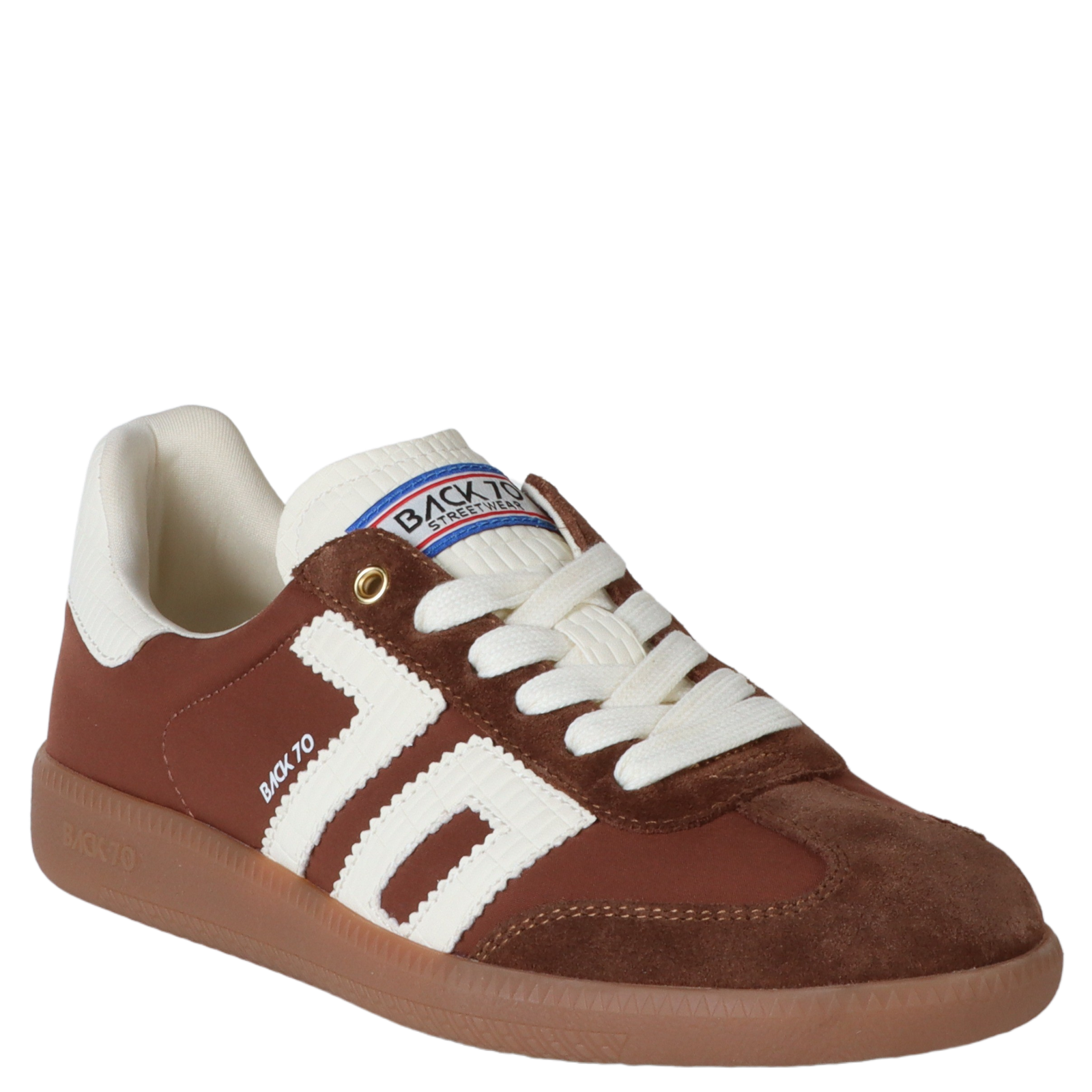 Brown and white sneaker with visible brand logo on a white background