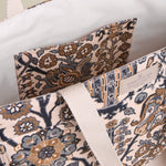 Patterned tote bags with visible branding on a neutral background
