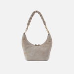 Gray handbag with a gold chain handle on a white background