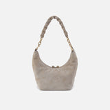 Gray handbag with a gold chain handle on a white background