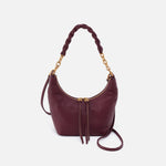 Hobo Astrid Small Crossbody in mulberry glaze leather with top zip closure and adjustable strap.
