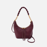 Hobo Astrid Small Crossbody in mulberry glaze leather with top zip closure and adjustable strap.
