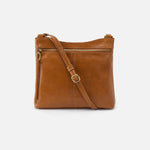 Hobo Cambel Crossbody bag in truffle leather featuring sleek silhouette and practical design.