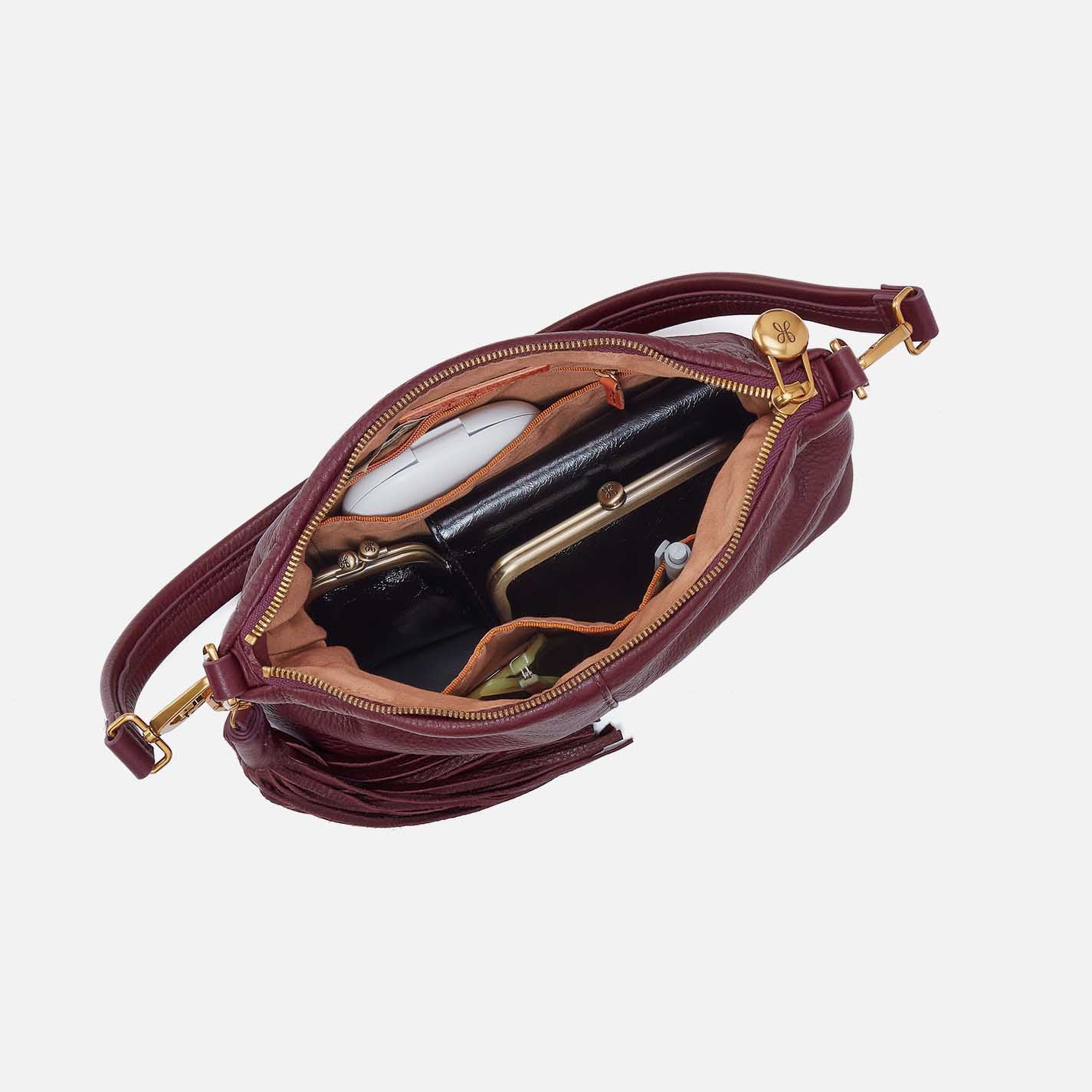 Mulberry glaze Hobo Kori Crossbody made from pebbled leather with sleek, structured design