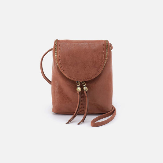 Brown leather crossbody bag with gold accents on a white background
