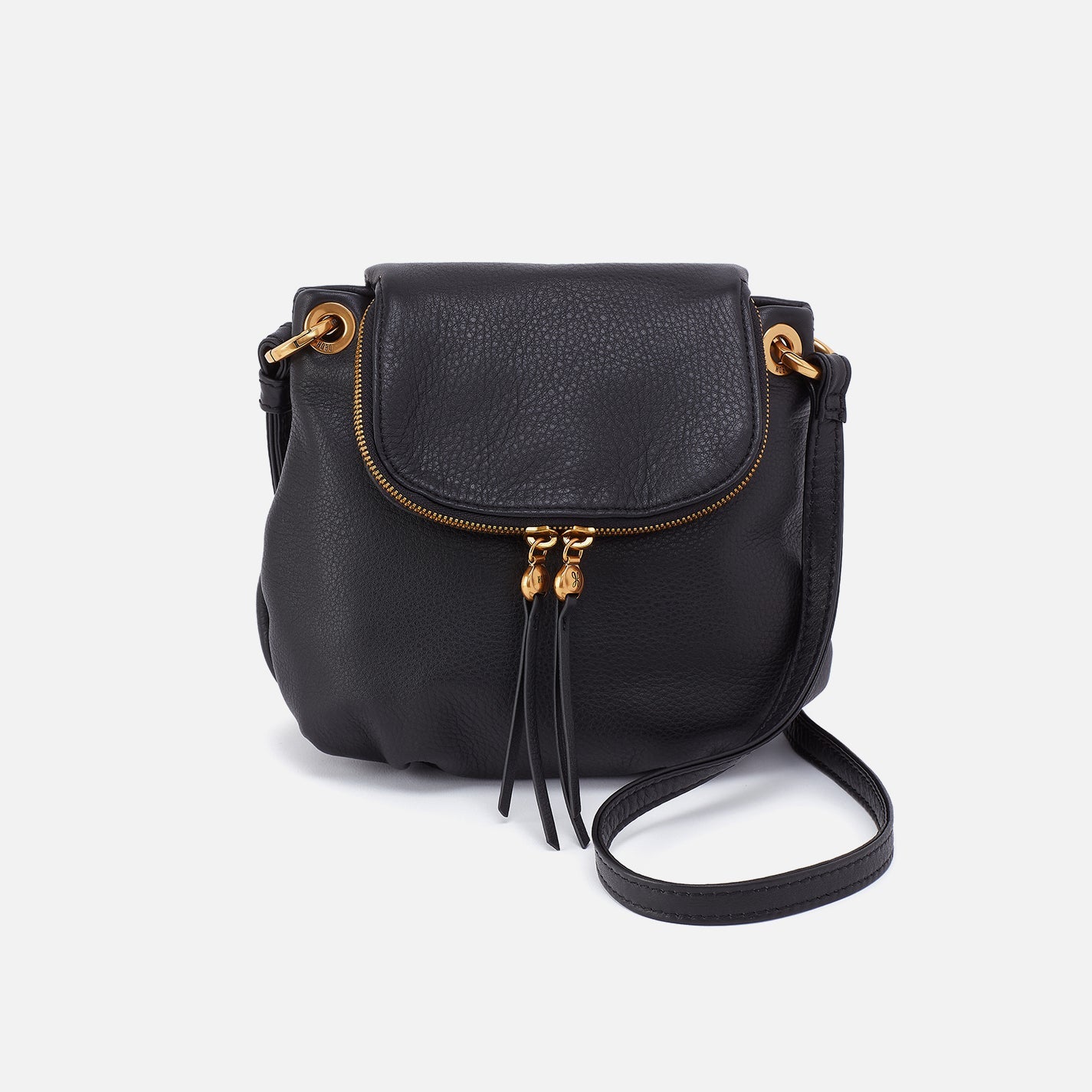 Black leather handbag with gold accents on a white background