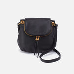 Black leather handbag with gold accents on a white background