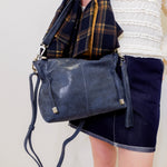 woman modeling the hobo kori crossbody 