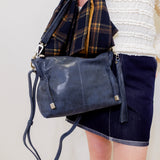 woman modeling the hobo kori crossbody 