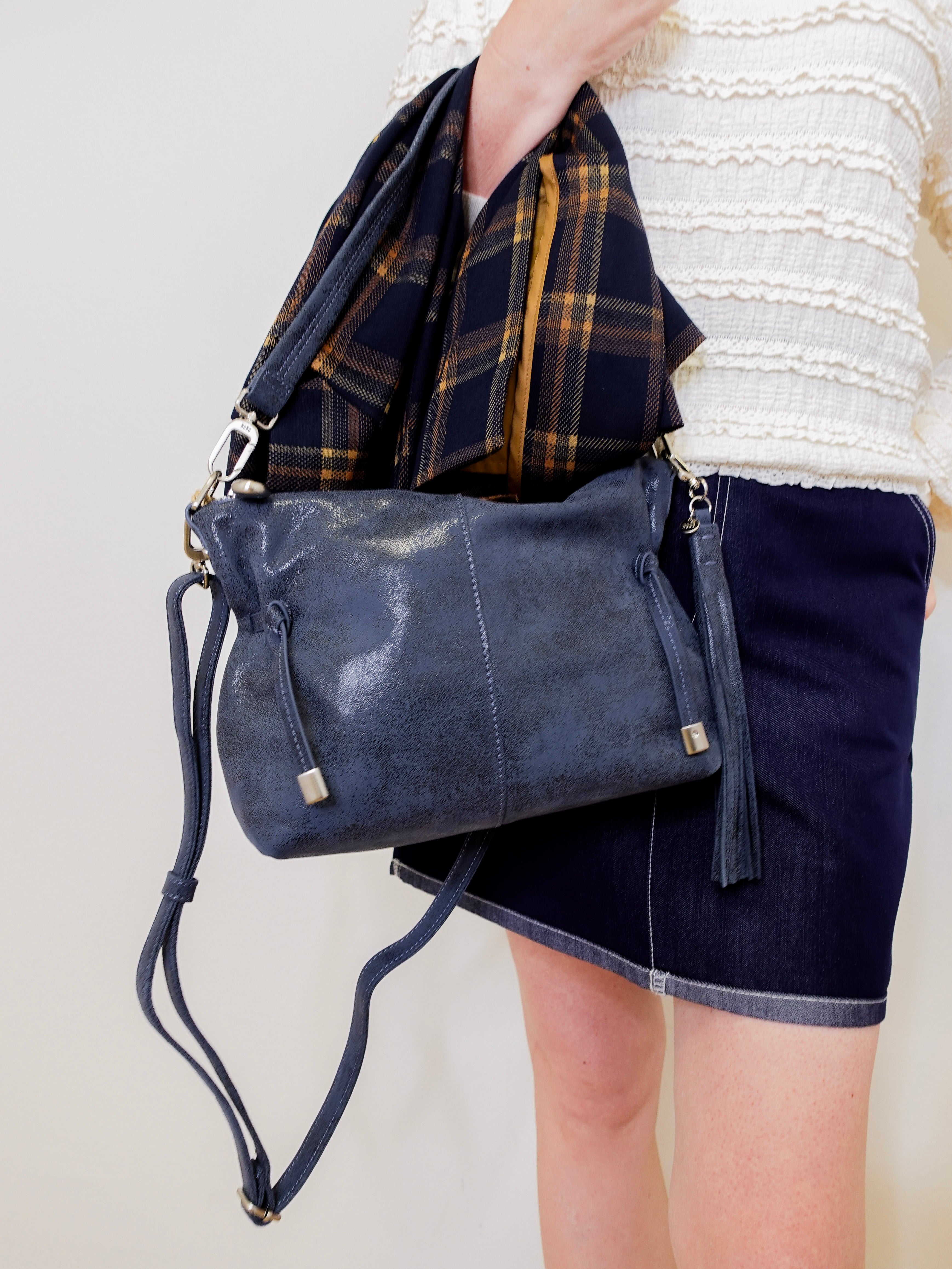 woman modeling the hobo kori crossbody 